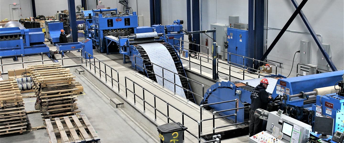 <p>Aerial shot of manufacturing warehouse using coil processing equipment from Braner USA</p>